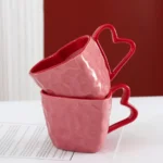 كوب السيراميك مع مقبض قلب